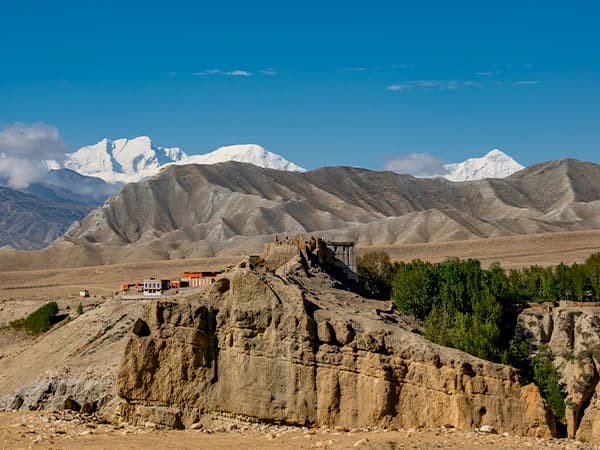 tsarang village with baraha sikhar and nilgiri in the background